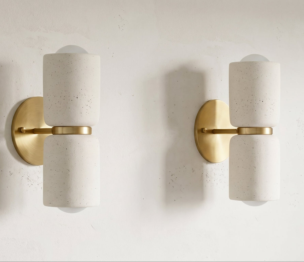 Pair of AX163 ceramic wall sconces with brass arms, matching modern wall sconces for a living room