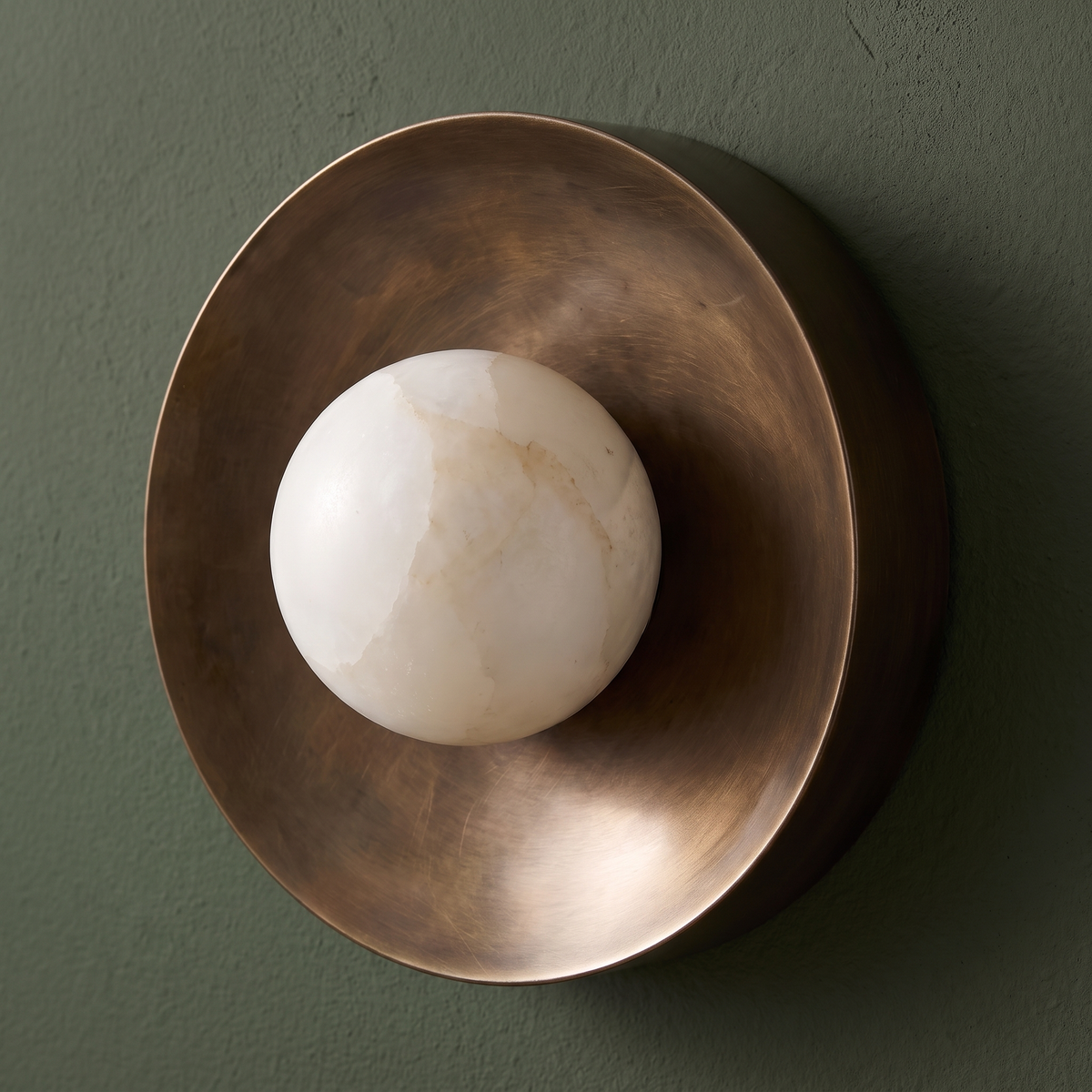 AX761 bronze dome wall sconce with alabaster sphere on sage green wall