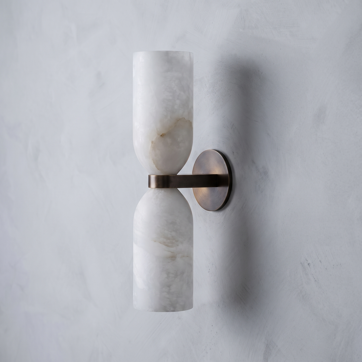 AX853 double alabaster wall sconce with bronze center mount, unlit side view