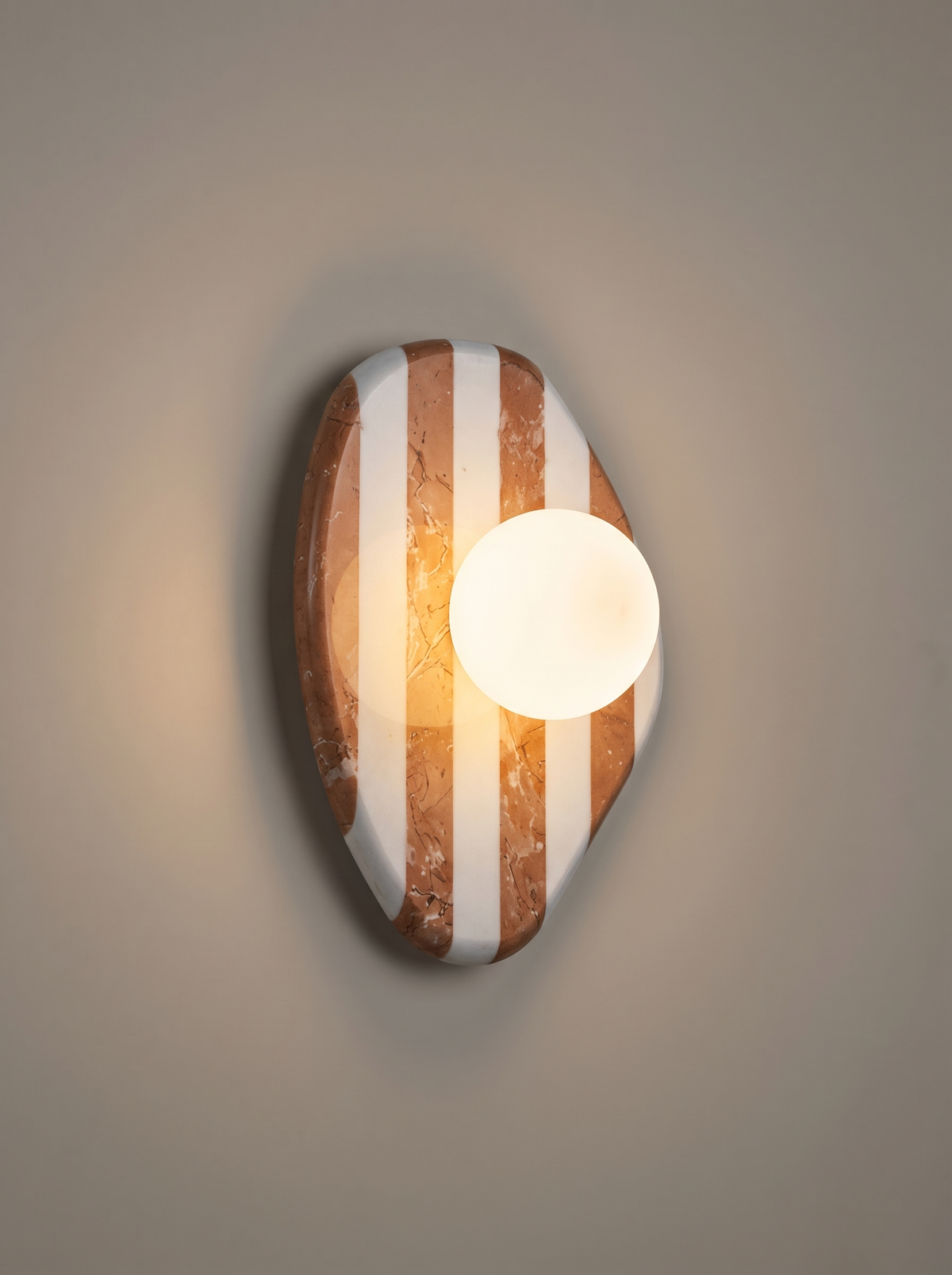 AX200 marble globe wall sconce lit with a warm glow, modern stone wall sconce for bedside or hallway
