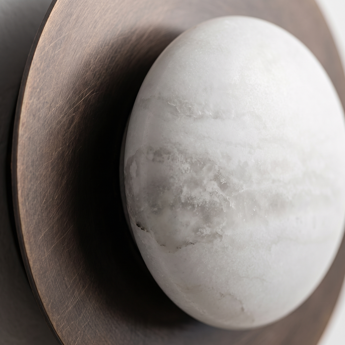 Alabaster orb in hand-finished aged brass, AX174 brass wall sconce with natural stone veining